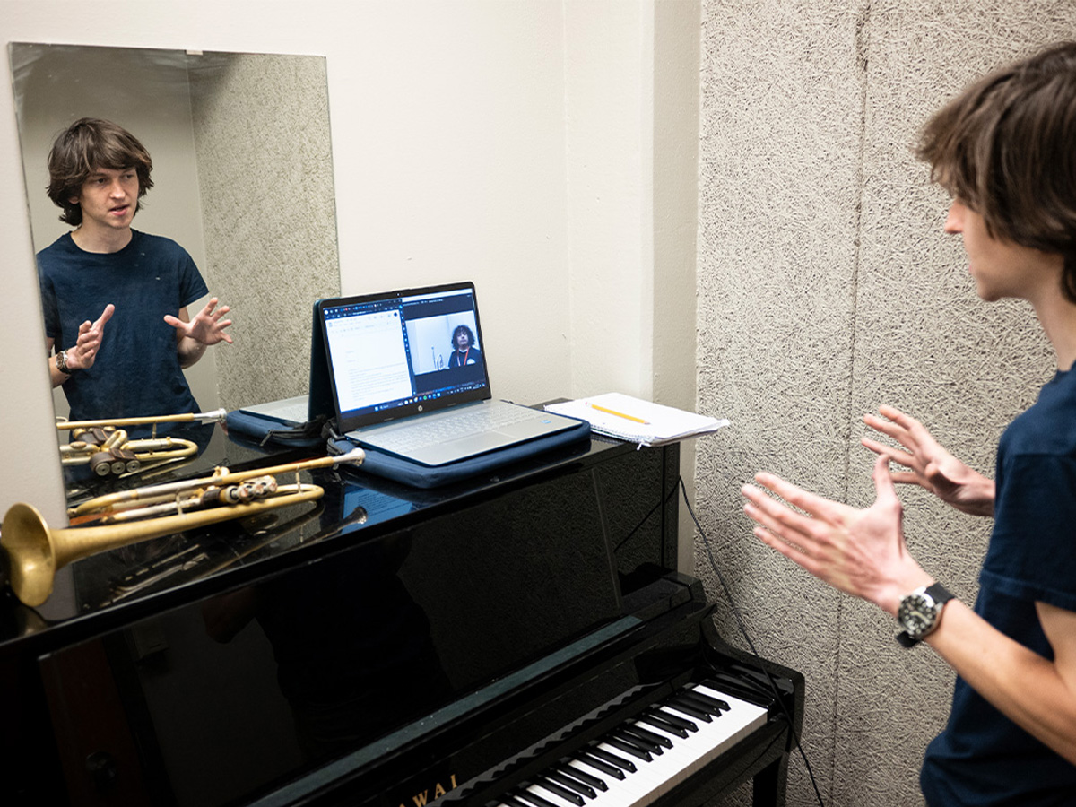Nathan Fisher, a first-year master’s student studying jazz trumpet, in a virtual music lesson with a Dallas ISD student (#2)