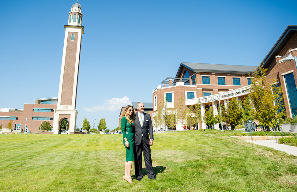 Mr. and Mrs. Ryan posing in front of tower