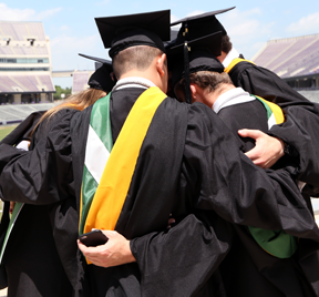 UNT Health Science Center graduates group hug