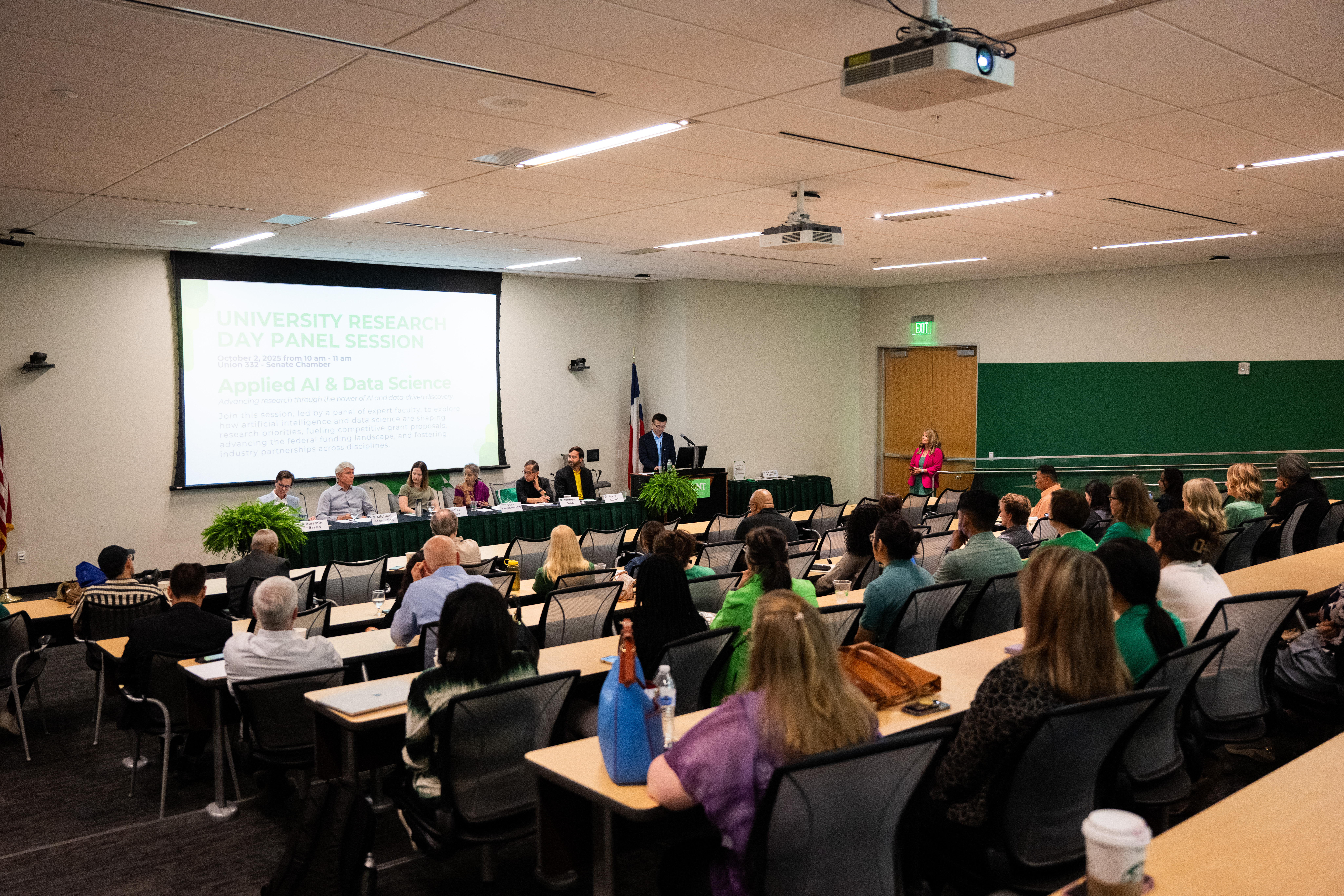 Photo of attendees at a UNT panel discussion.