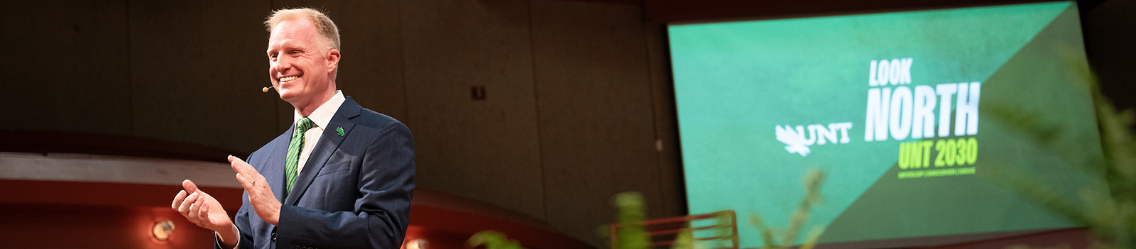 A photo banner of UNT president Harrison Keller unveiling the strategic 'Look North: UNT 2030' event Top horizontal, narrow-cropped photo banner of UNT president Harrison Keller unveiling the strategic 'Look North: UNT 2030' event.