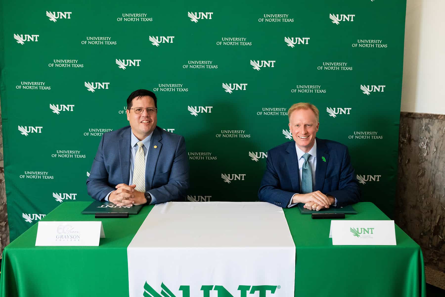 Photo of Grayson College's president Dr. Jeremy McMillen (left) and UNT president Dr. Harrison Keller 