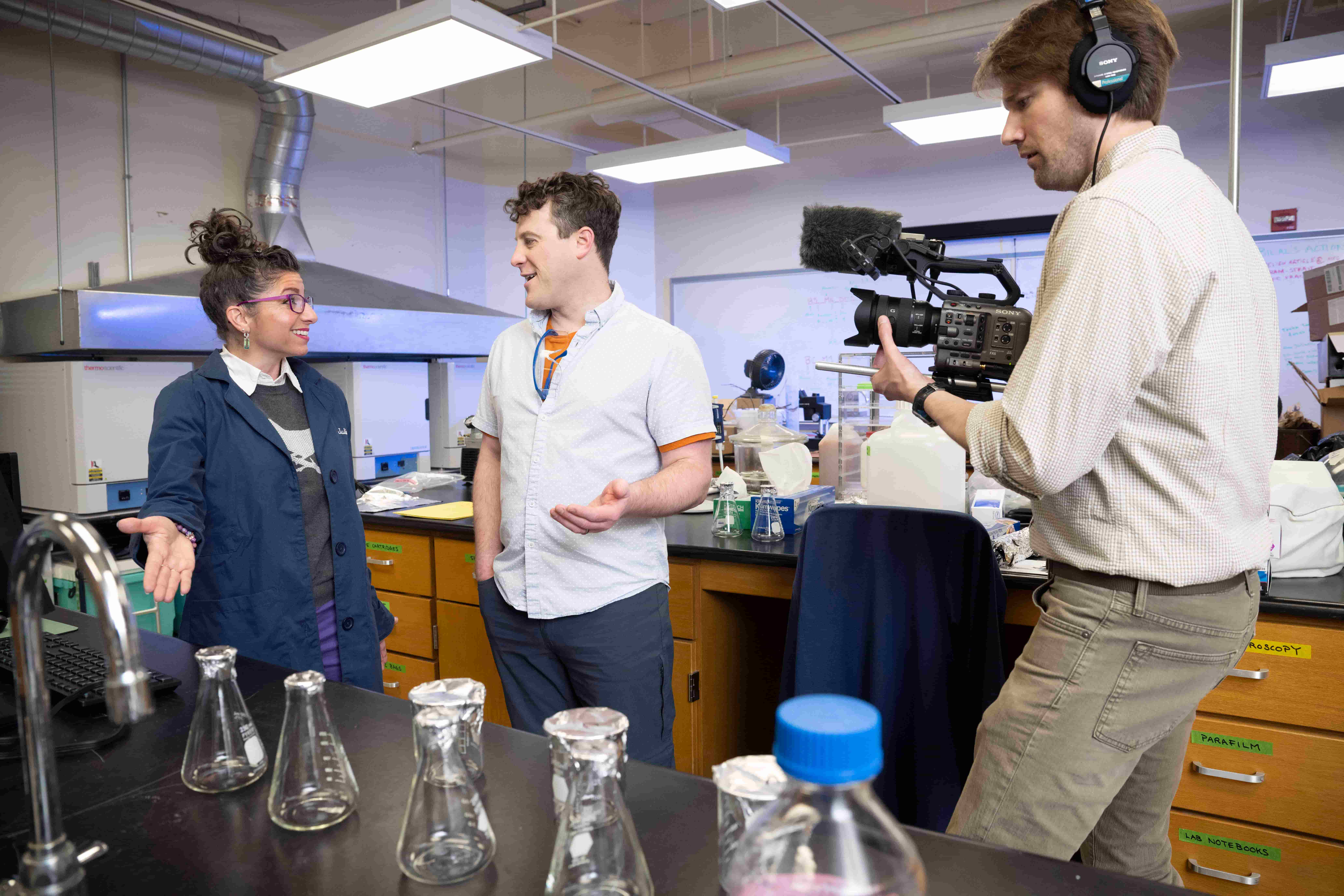 Full photo of UNT's Juliana D'Andrilli smiling warmly while being interviewed and filmed 