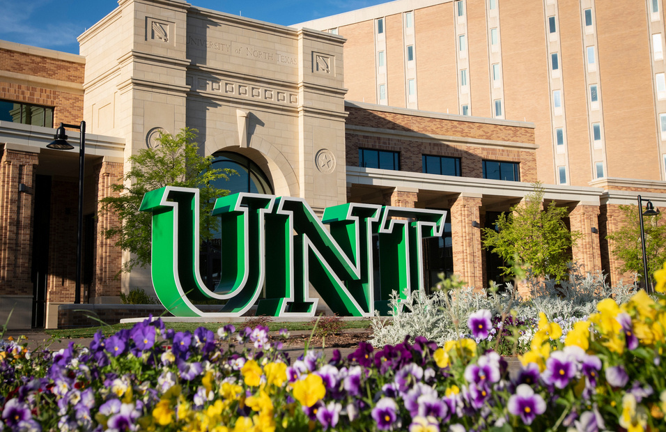 unt-letter-sign-by-union-purplewhite-flowers