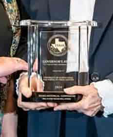 Photo closeup of the 2025 Texas Historical Commission Governor's Award for Historic Preservation