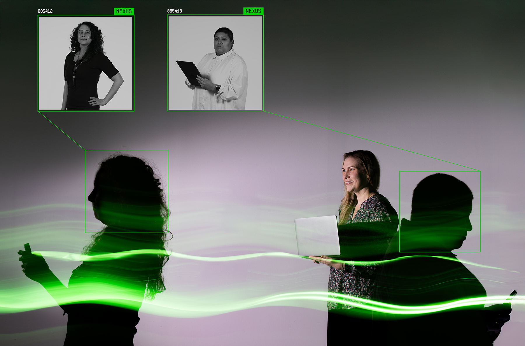 A person stands holding a laptop, flanked on both sides by two people in silhouette, each holding electronic devices. A photo of a woman standing holding a laptop, flanked on both sides by two people in silhouette, each holding electronic devices.