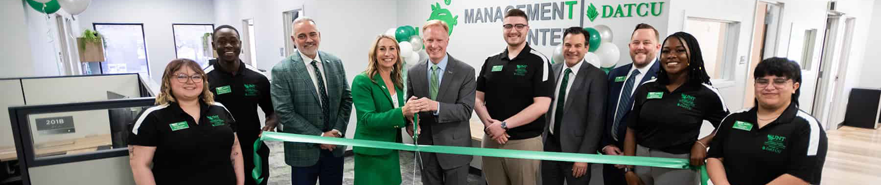 Top wide-narrow banner photo of the UNT ribbon cutting for the Student Money Management Center, powered by DATCU