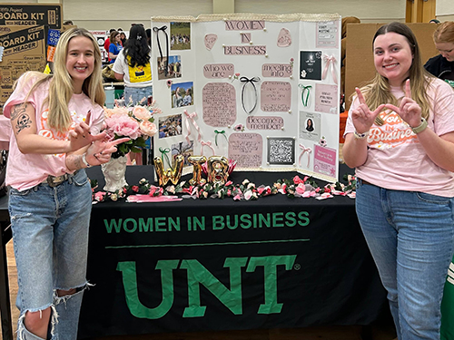Women In Business members tabling at an event