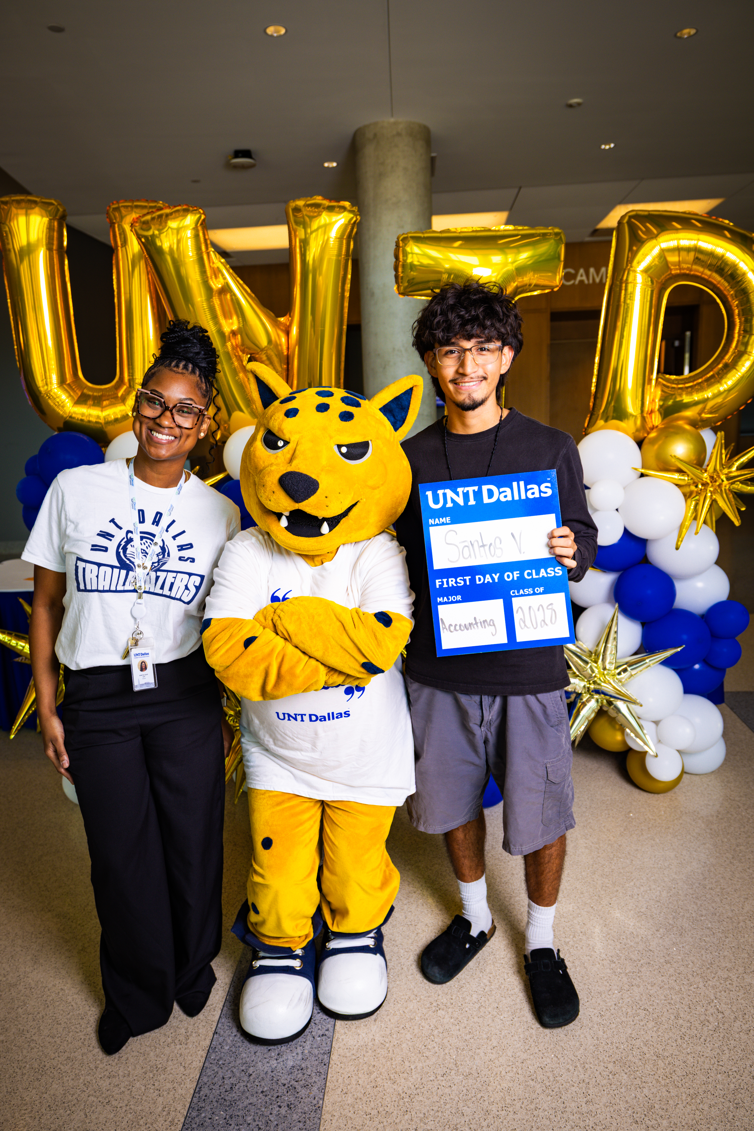 Photo of two UNT Dallas students and Mascot Jax on the First Day of the Fall 2026 Semester