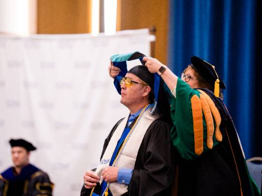 UNT Dallas Master's Hooding Ceremony