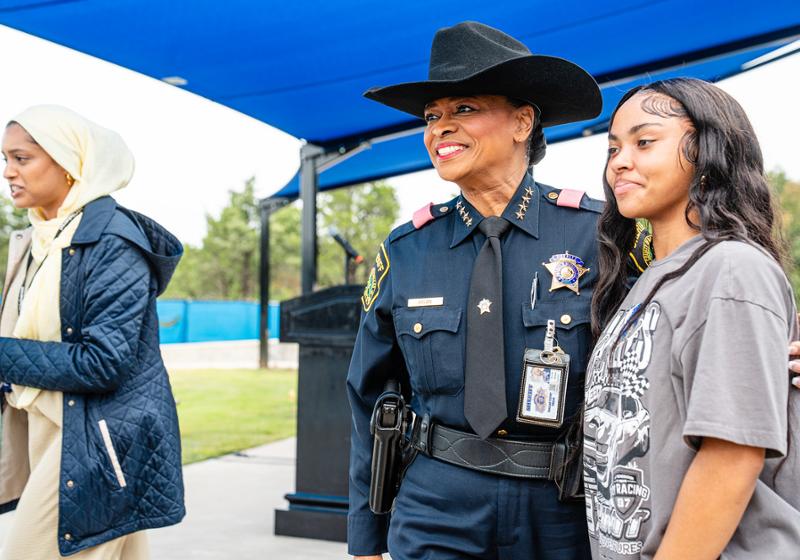Dallas County Sheriff Marian Brown poses for a photo with a high school student Photo of Dallas County Sheriff Marian Brown poses for a photo with a high school student
