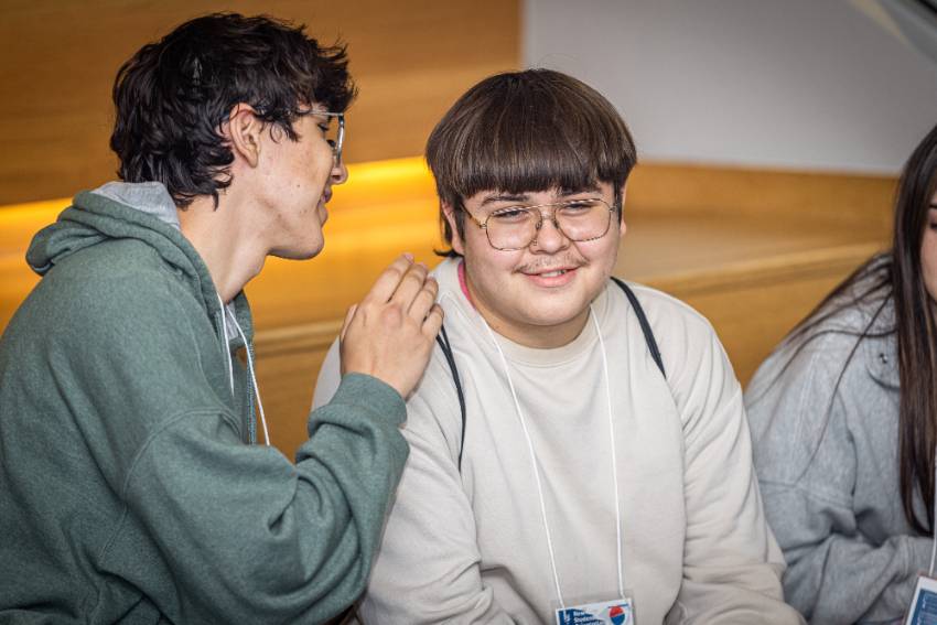 Photo of two new male students taking to each other, starting a friendship during UNT Dallas's 2025 NSO 