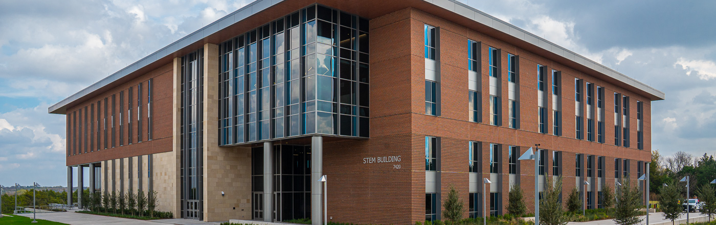 Top horizontal, narrow-cropped photo banner of the finished UNT Dallas STEM building on campus