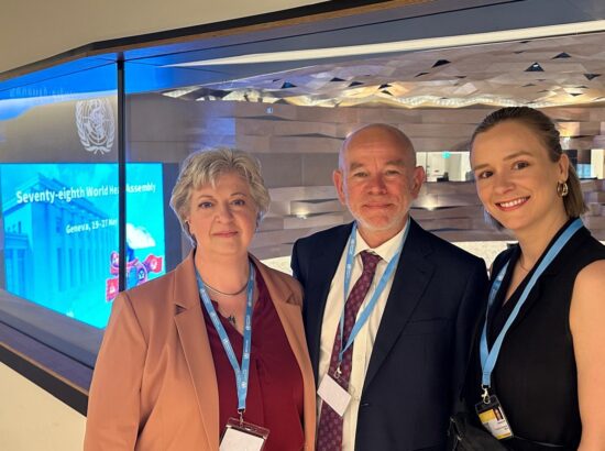 Photo of UNT Health's Dr. Kendi Hensel along with 2 other WHO officials pose for a photograph
