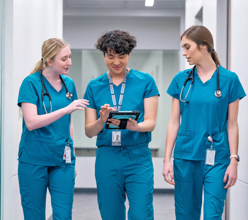 UNT Health nursing students looking at a tablet Full uncropped photo of UNT Health nursing students looking at a tablet