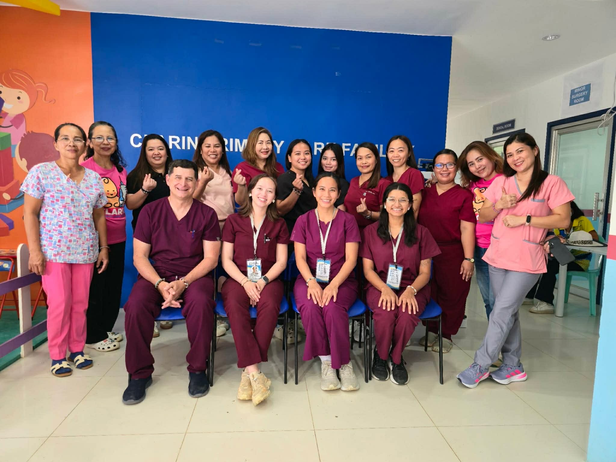 Photo of full uncropped UNT Health TCOM students and faculty, including Dr. Thomas Shima, pose with local medical staff at the Clarin Primary Care Facility in Bohol, Philippines, during a January medical outreach mission.
