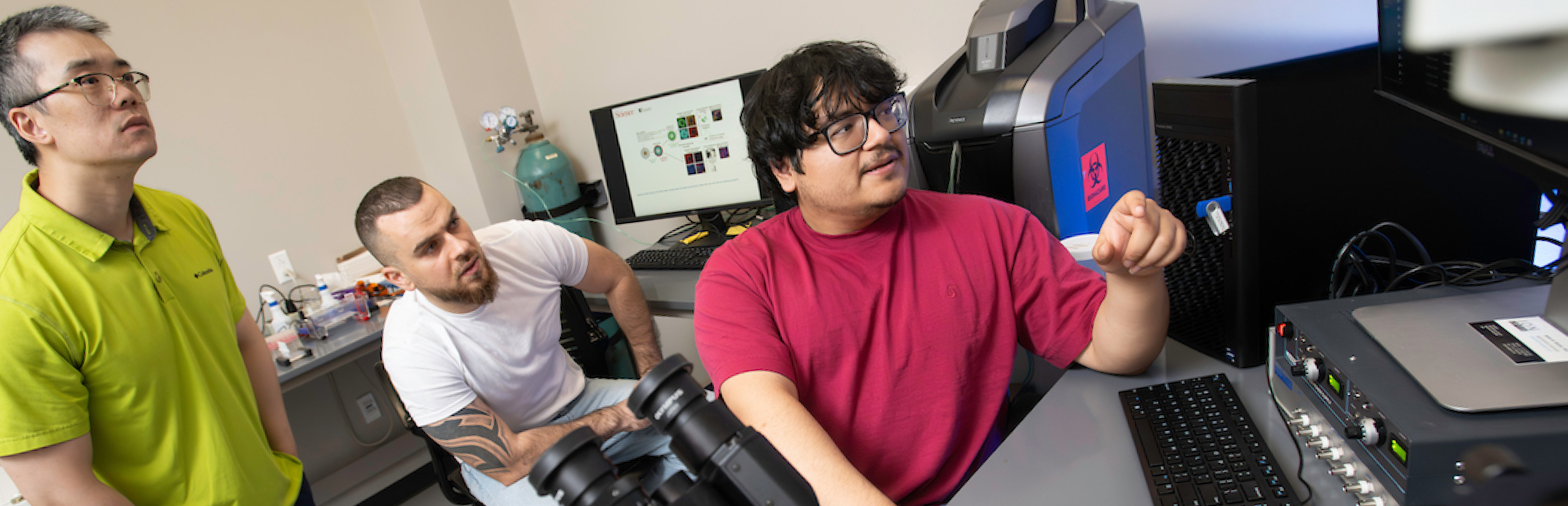 A photo of UNT's Adam Yang, assistant professor in the College of Engineering’s biomedical engineering department, with Ph.D. students Marcel El-Mokahal and Angello H. Gomez.